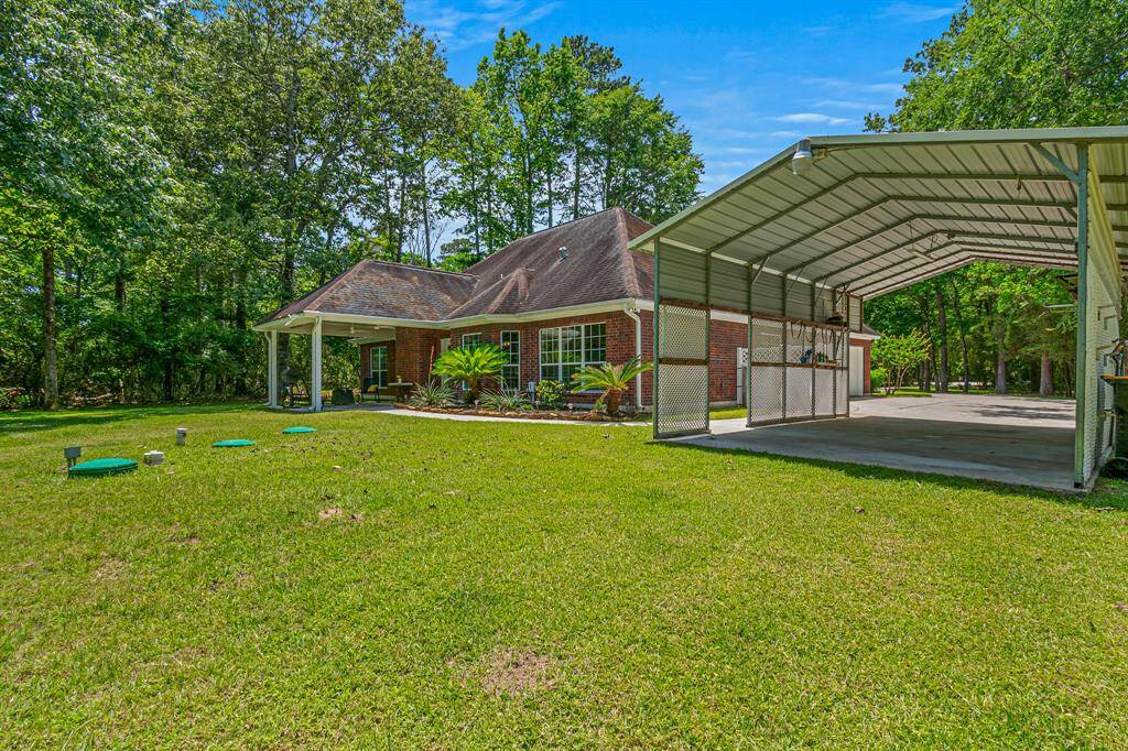 Benefit from the convenience of a detached carport on this one-acre property, offering ideal protection for vehicles or extra covered space.