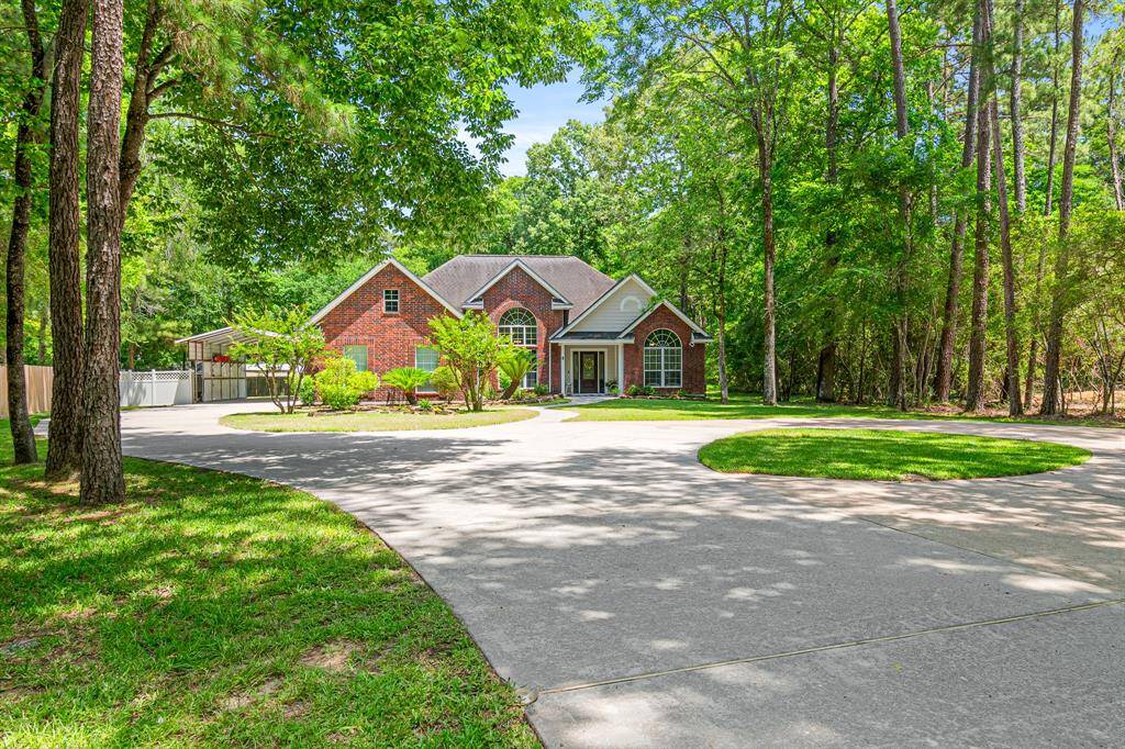 The private driveway flows into a practical circle drive.