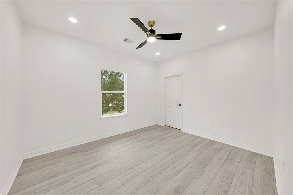 Versatile upstairs room ideal for home office, playroom, or guest space