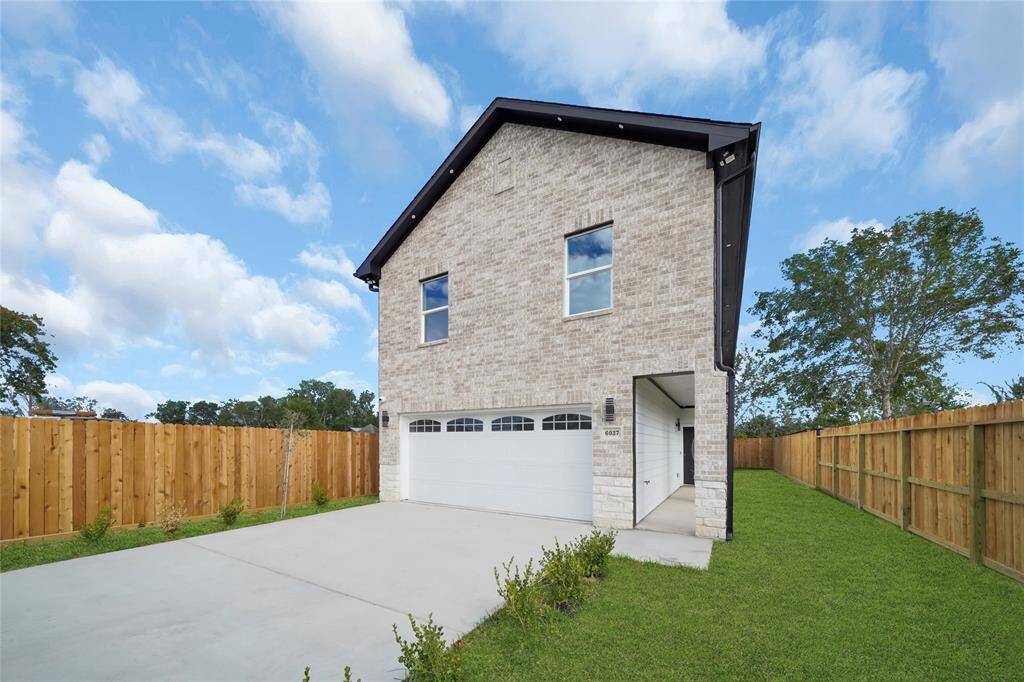 ngled exterior view highlighting the home’s attractive elevation and fenced lot.