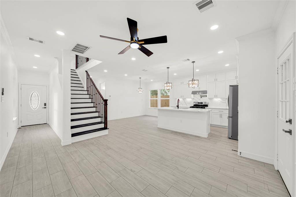 Cozy living area overlooking dining space, designed for comfort and entertaining.