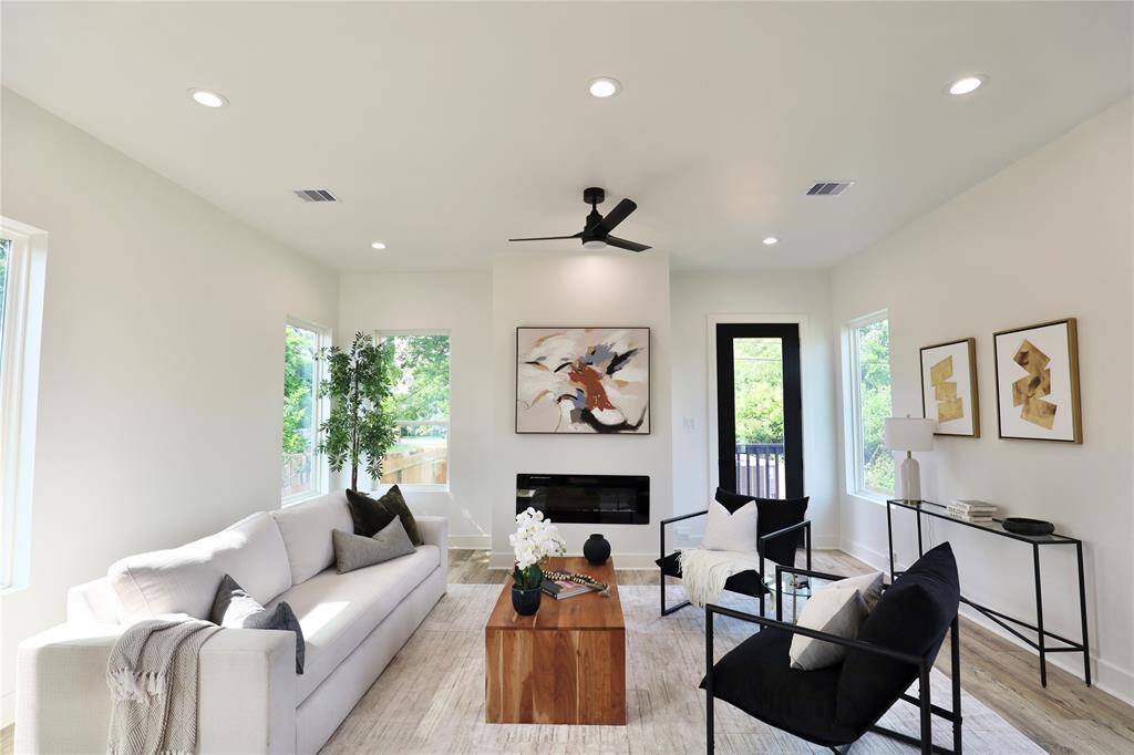 Luxury living area designed for comfort with easy to your SPACIOUS backyard, unwind while enjoying the backyard visuals.