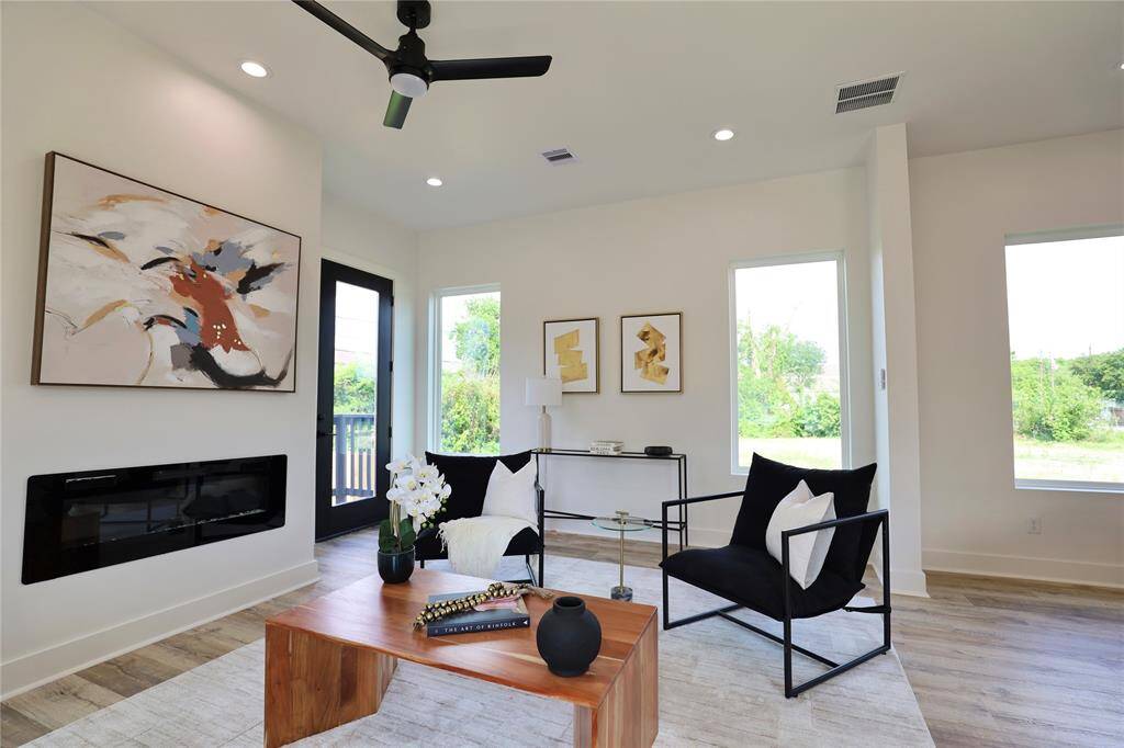 A cozy feeling in your living room courtesy of the electric fireplace.