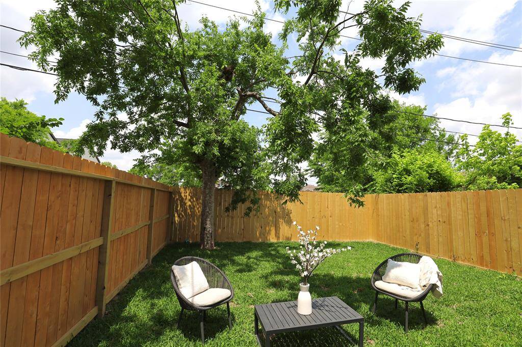Mature tree offering shade to your spacious backyard. Fully fenced cedar.