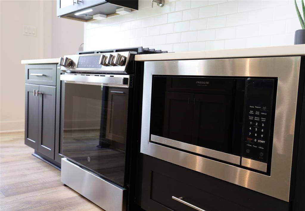 Every area showcases an upgrade, notice the hidden outlet and under cabinetry lighting.