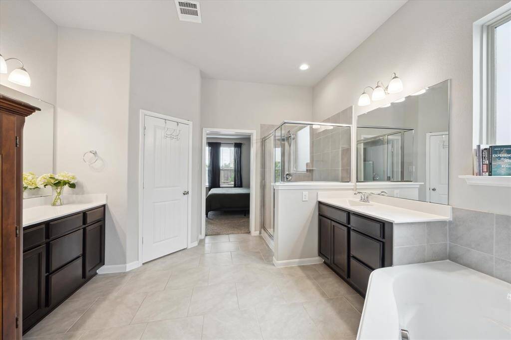 Water closet is located across from the shower with easy access from the bedroom.