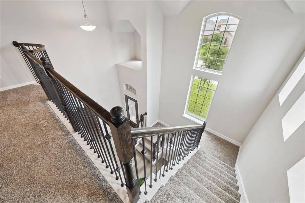 Another view of staircase with a beautiful overlook.