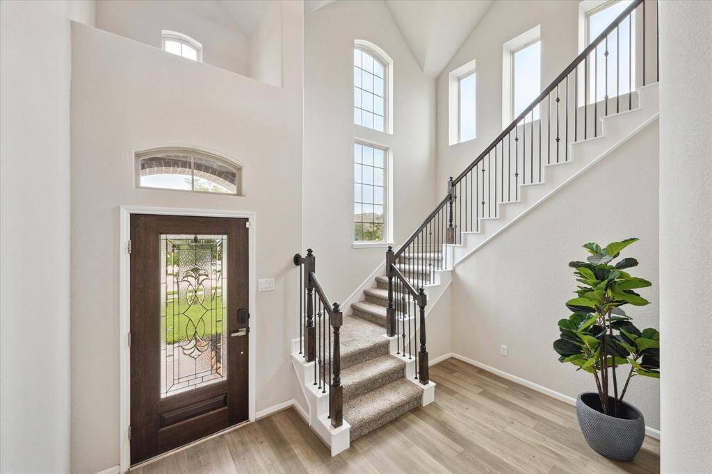 The front door, staircase and windows let in the perfect amount of natural light. Also, I like the entry it does not feel cramped when you open the door.