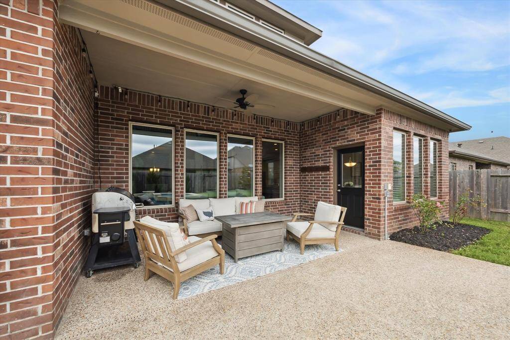 You have a spacious area for outdoor entertaining under the covered patio.