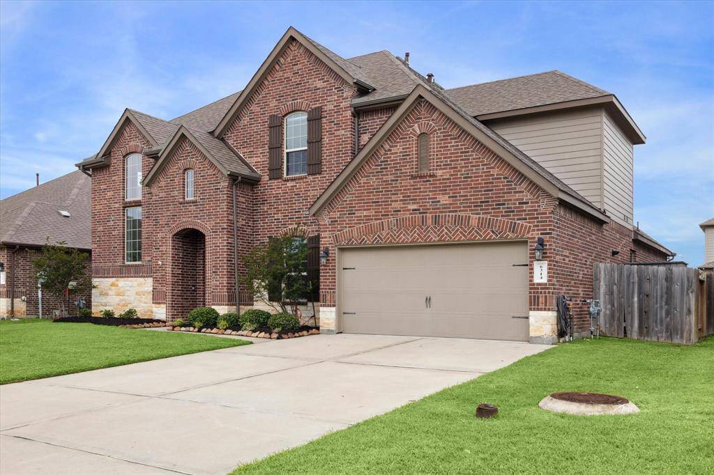 Welcome home to 6314 Woodbend.