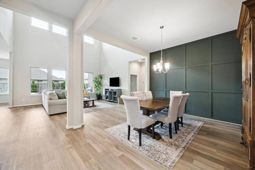 In this picture you can see how the dining area flows into the main living area.