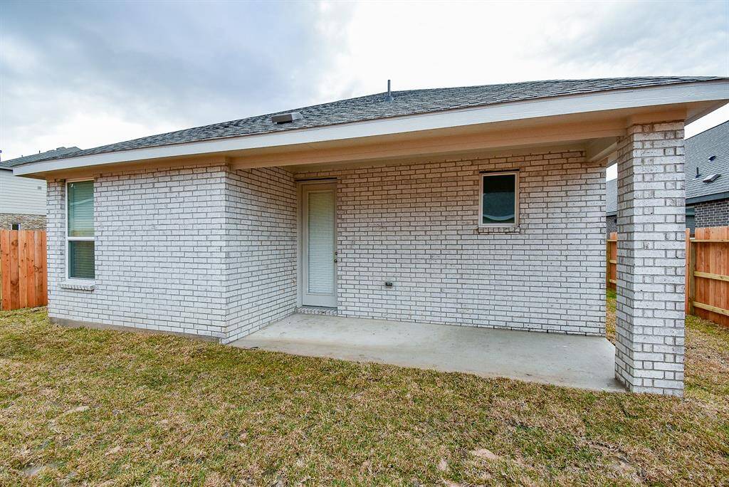 Enjoy outdoor living with a spacious, sheltered patio perfect for relaxation and entertaining.