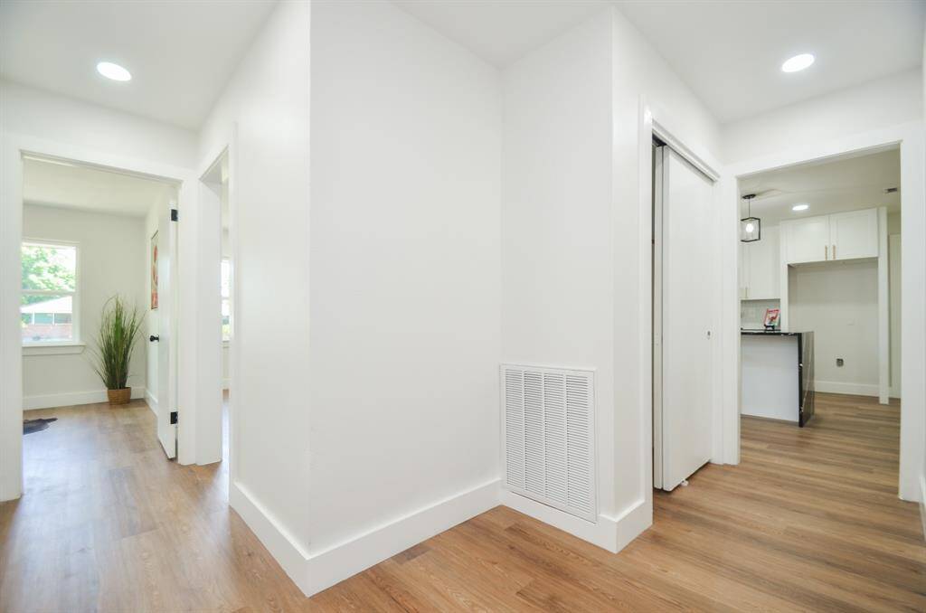 Hallway leading to bedrooms and living spaces