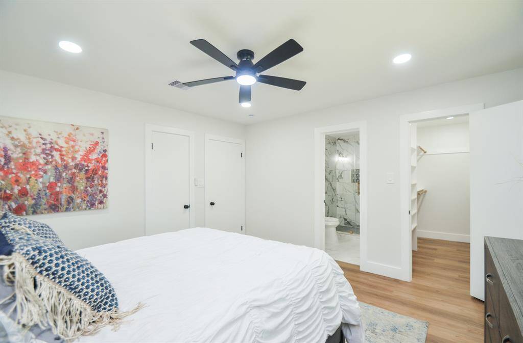 Primary Bedroom with Colossal closet and Beautiful Bathroom