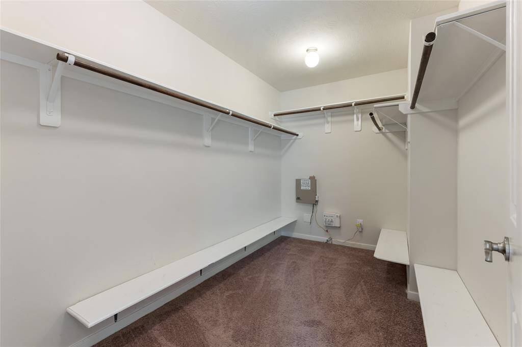 Walk-in closet in primary suite