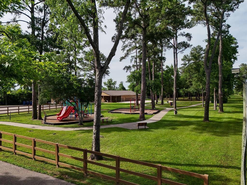 Oakwood Glen offers multiple community amenity centers, and this is just one of them—featuring peaceful park spaces and scenic walking trails perfect for daily strolls, outdoor play, and connecting with neighbors in this welcoming neighborhood.