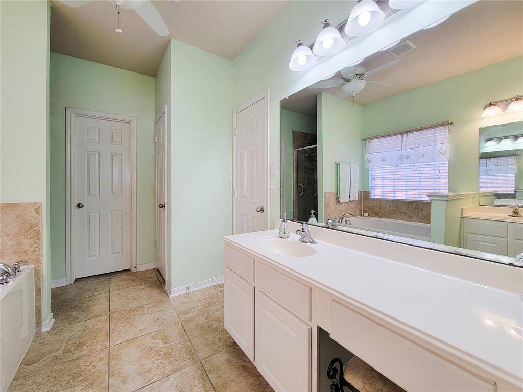 The open layout connects to the dining area and kitchen, enhancing the sense of space.