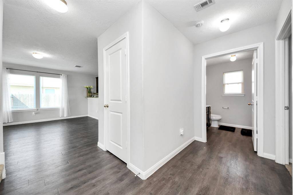 The heart of the home, this spacious living room offers a warm and inviting ambiance