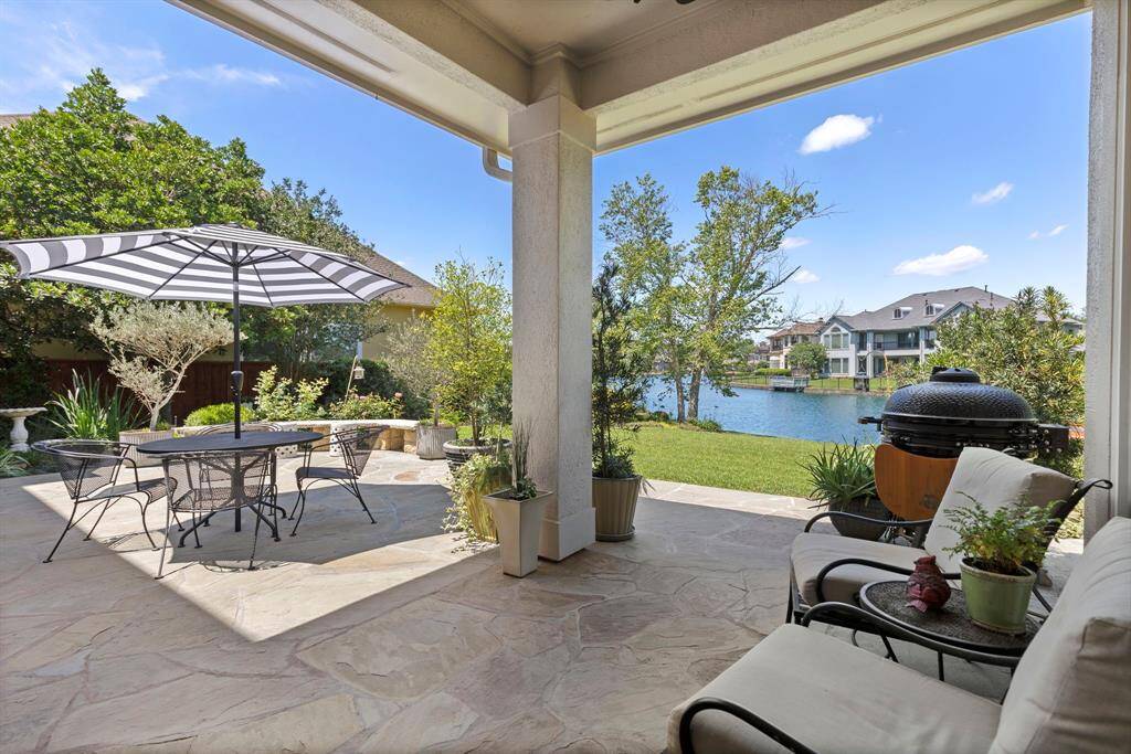 Covered patio area with beautiful view of the lake