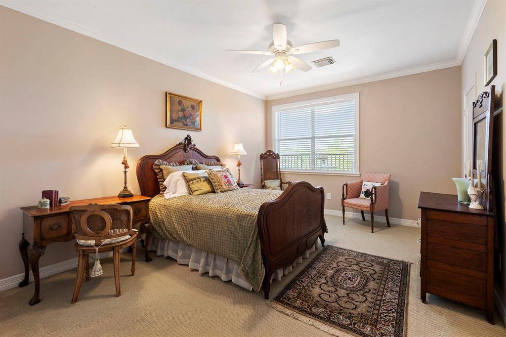 Large bedroom upstairs with large walk-in closet and attic entry.  Has an adjoining Jack and Jill bathroom.