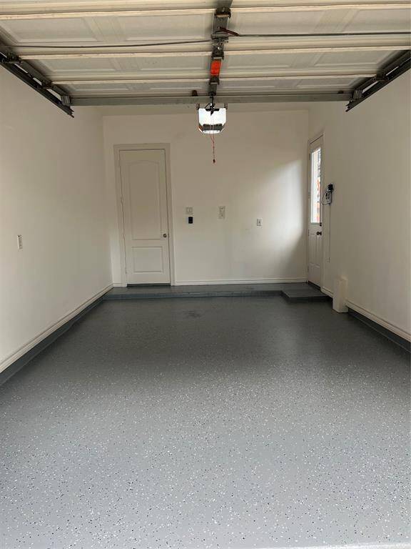Single car garage with new Epoxy fleck floor