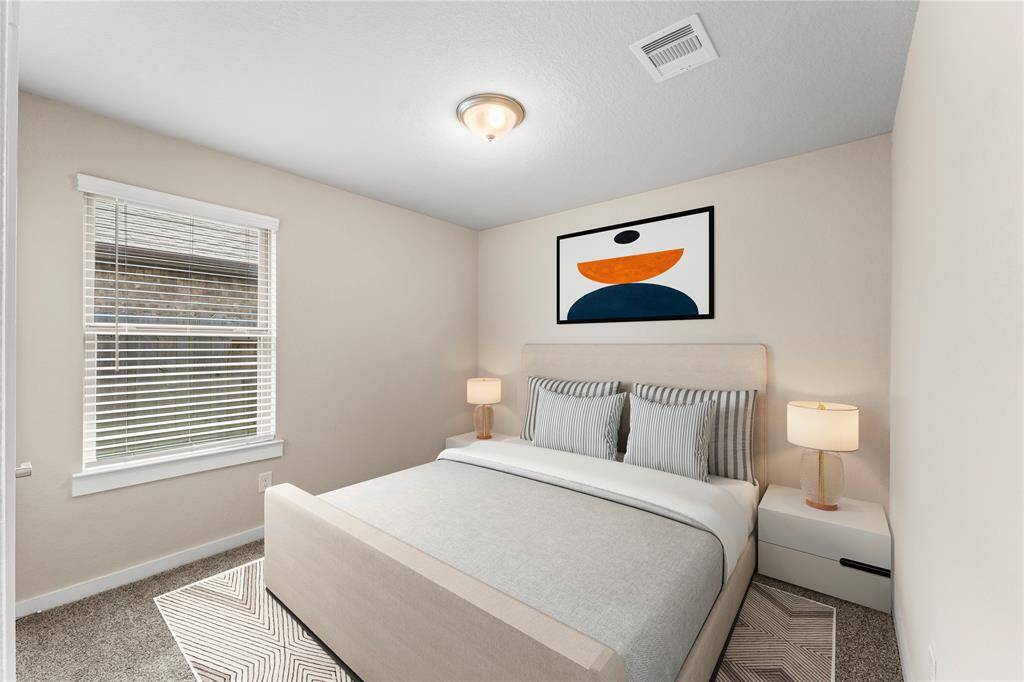 The spacious third bedroom and plush carpet create a cozy retreat, while the neutral color palette ensures easy customization.