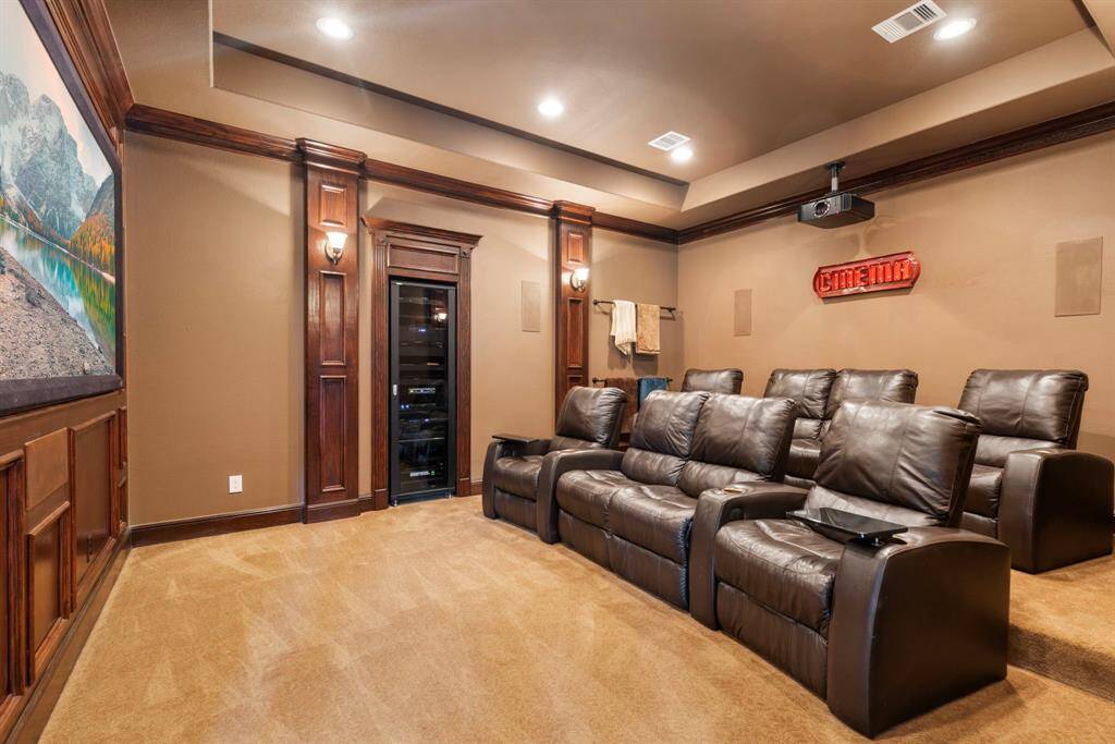 Downstairs Media Room. All furniture & AV equipment included.