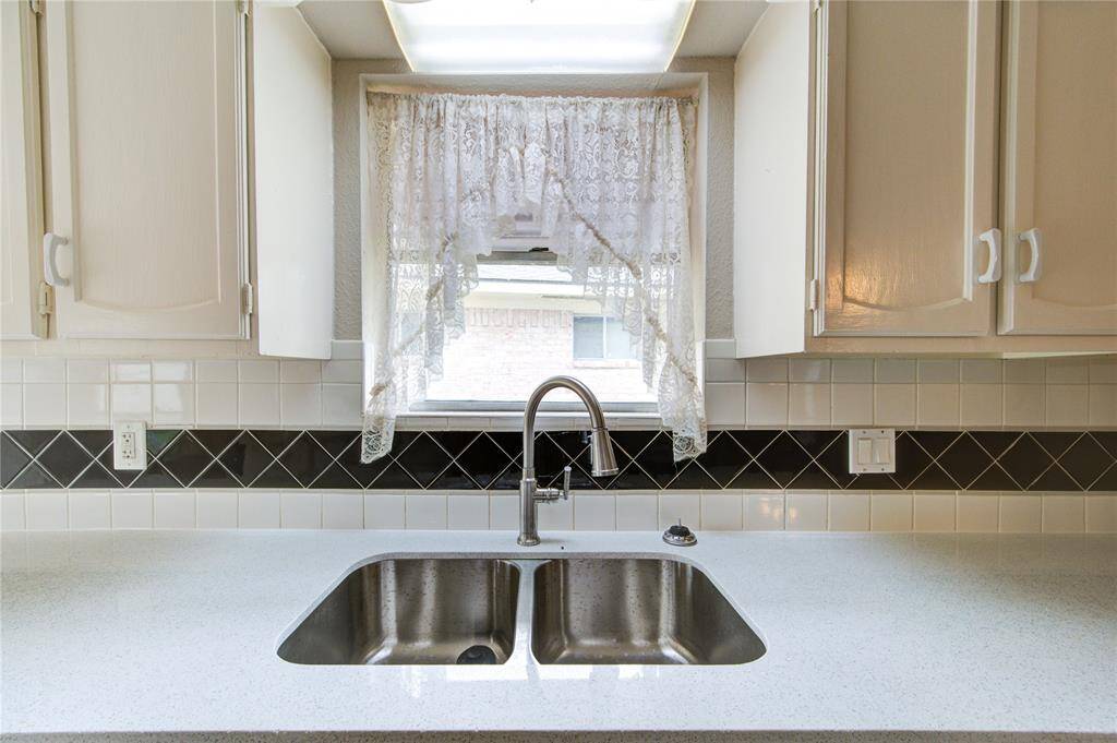 Brand new sink and faucet and garbage disposal