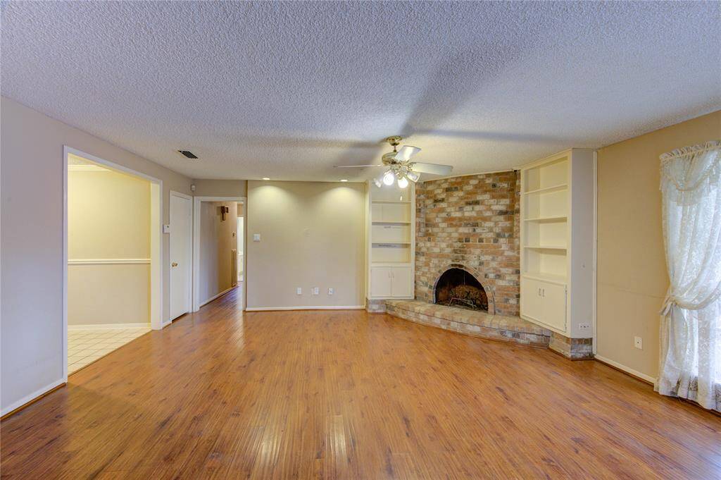 Family room with tons of built in shelves