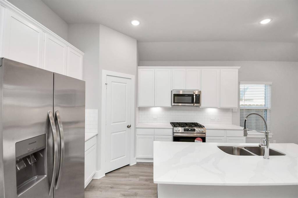 Sleek look with new appliances throughout!
