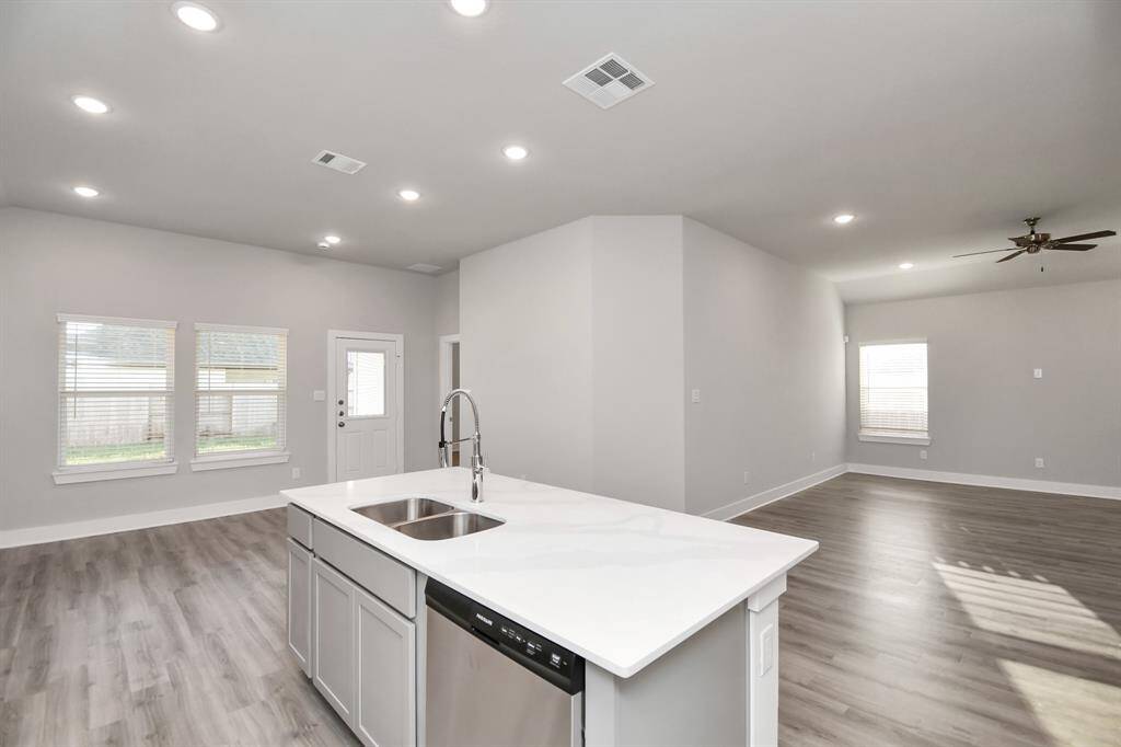 Open floorplan for kitchen, breakfast area, and living room