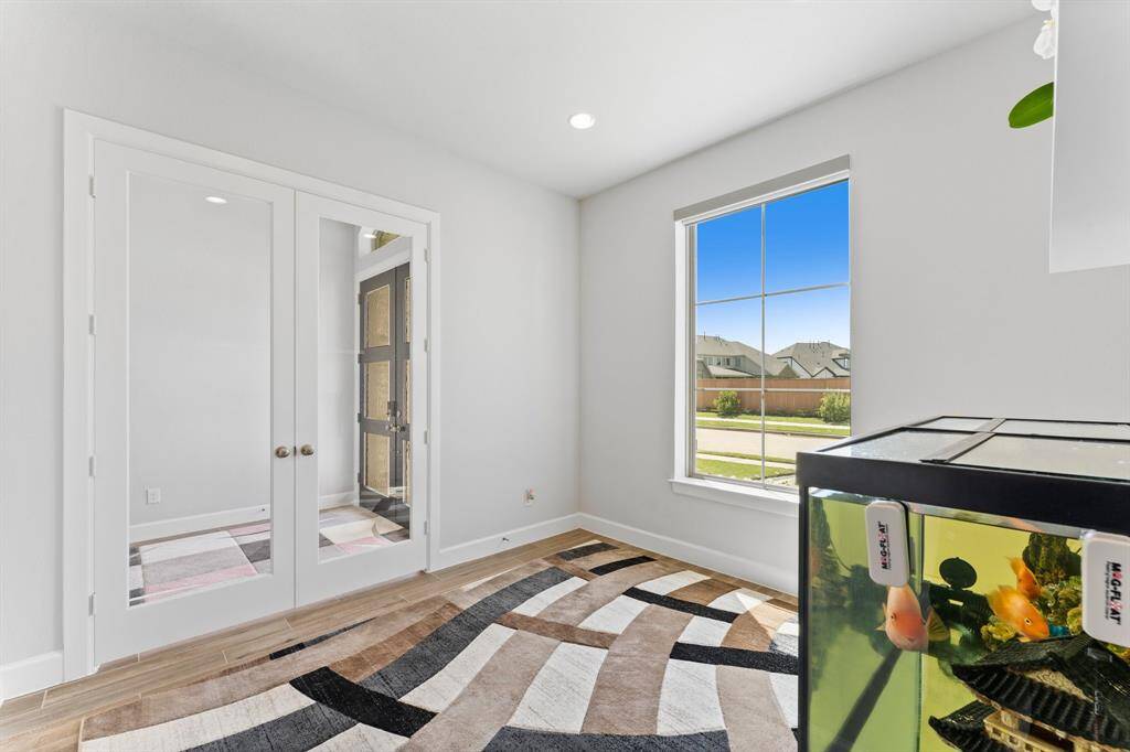 Another view of the 12x11 Home Office .large window offering plenty of natural light and a view of the neighborhood.