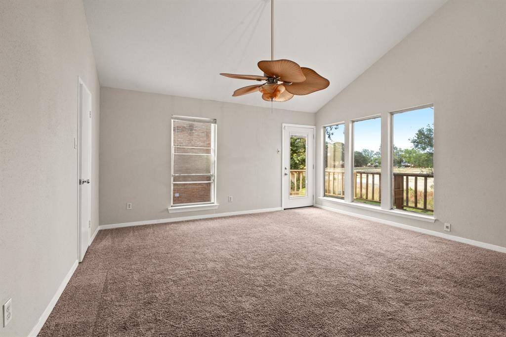 Upstairs Primary Bedroom with access to the deck