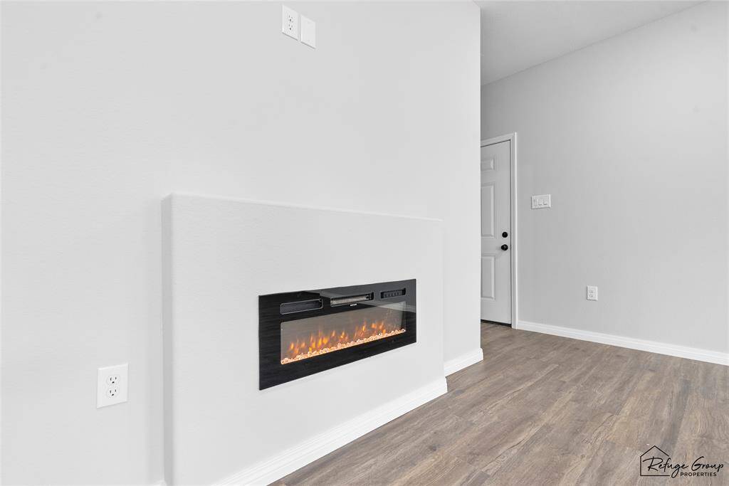 Fireplace can change colors, can also blow heat or just look pretty for the occasion. It also has a timer.