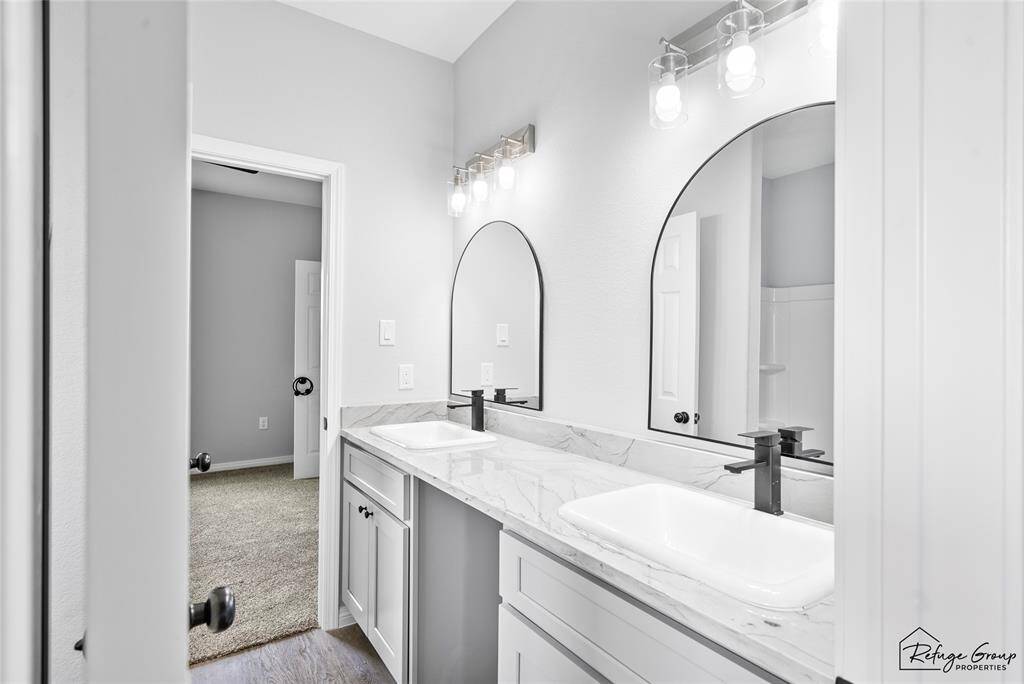 Jack and Jill Bathroom from Bedroom 2 Granite countertop
