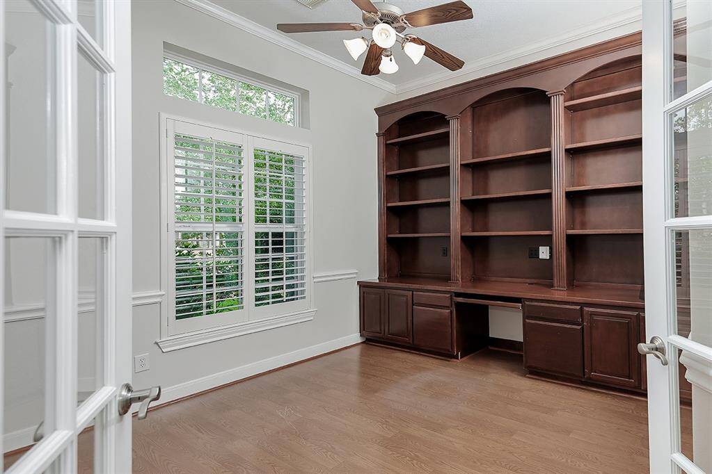 Home office/study/library with custom shelving