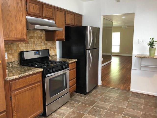 Picture of kitchen area off dining area.