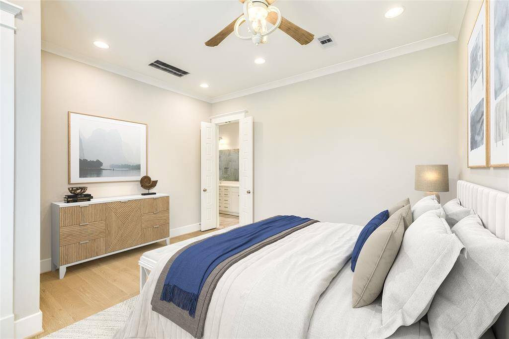 VIRTUALLY STAGED - The Primary suite on the first floor is king-sized and features plenty of space in the HUGE walk-in closet and en-suite bath.