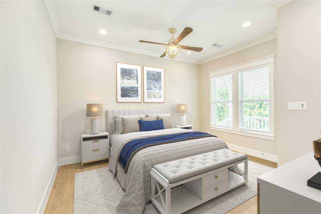 VIRTUALLY STAGED - Another view of the Primary bedroom on the first floor.