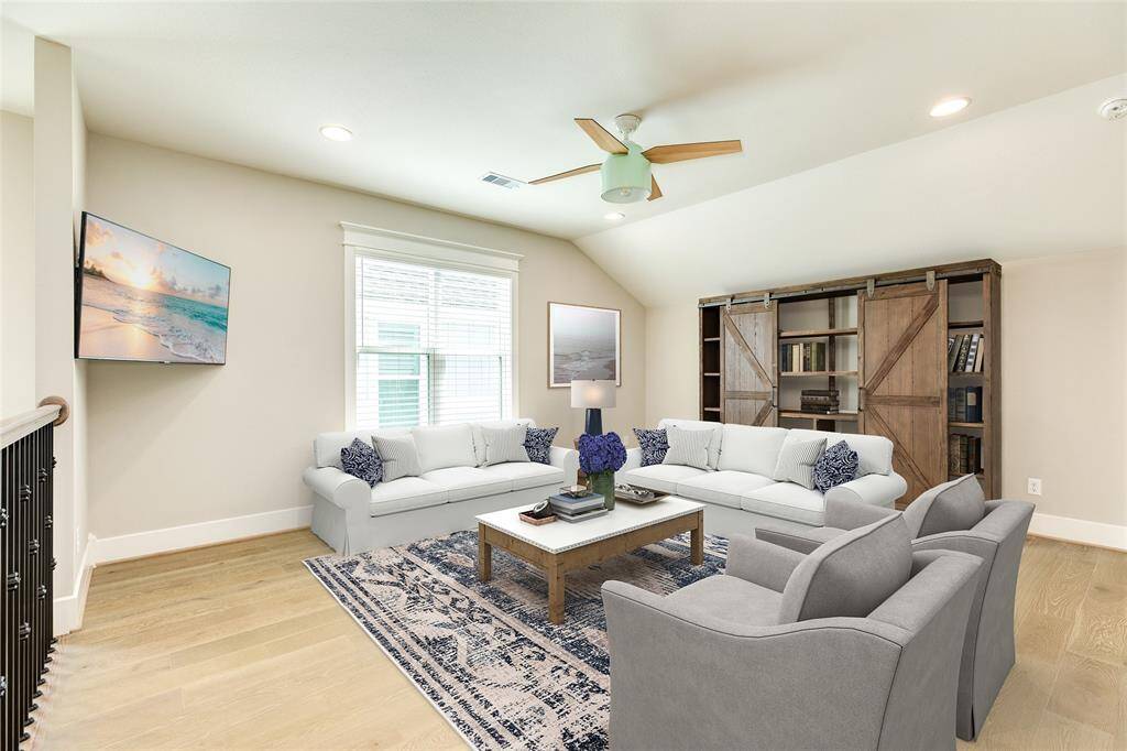 VIRTUALLY STAGED - This is the second floor living area. This space is perfect for a game room, media room, play room, or anything else needed. Maybe a morning kitchen to serve the upstairs suite for guests or multi-generational living?