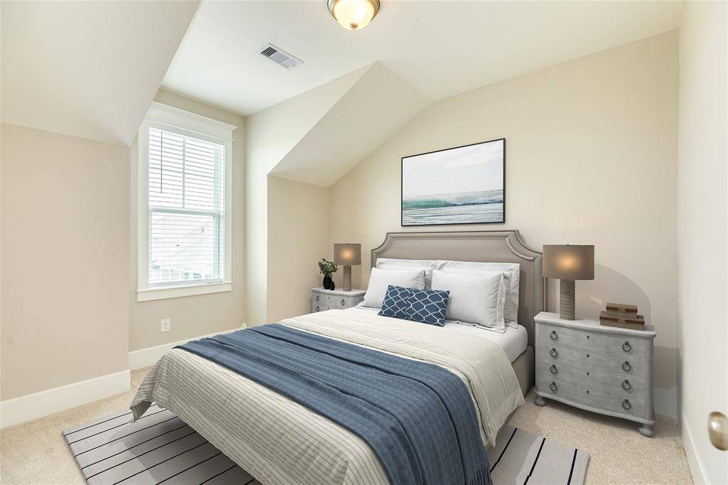 VIRTUALLY STAGED - This bedroom is on the Northeast corner of the house upstairs and features high ceilings and abundant natural light.