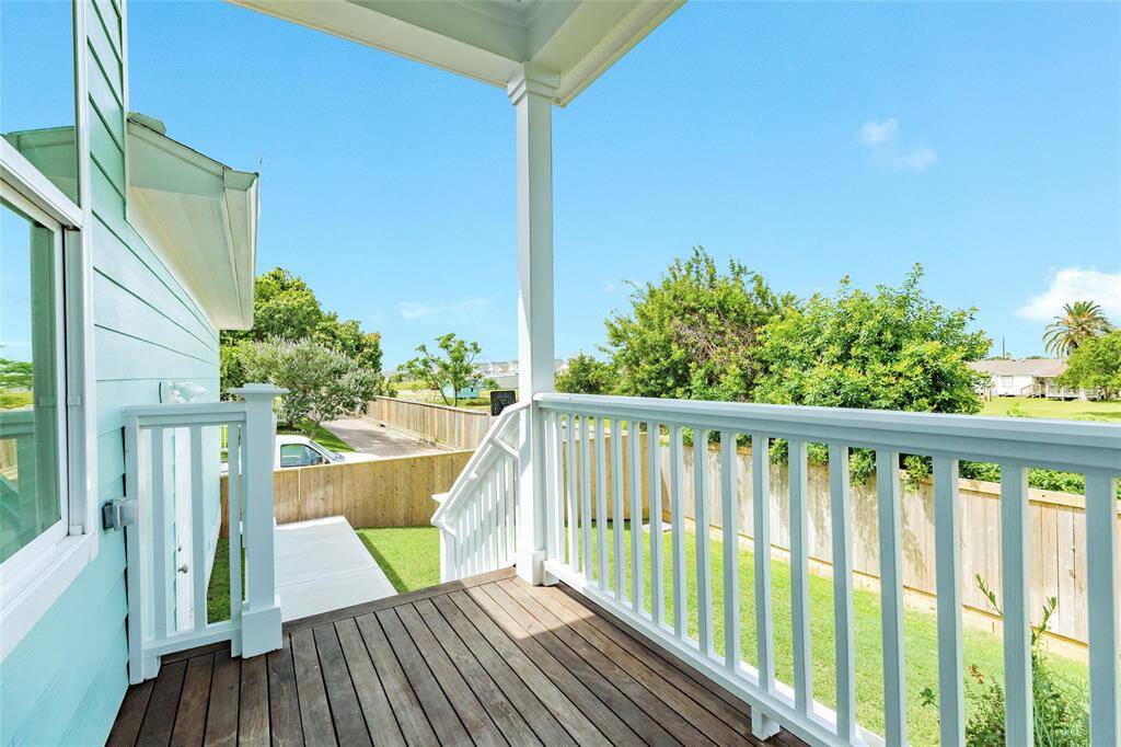 The back porch is also covered and connects to the garage, the alley and spare parking pad, a perfectly placed basketball goal, and a large side yard!