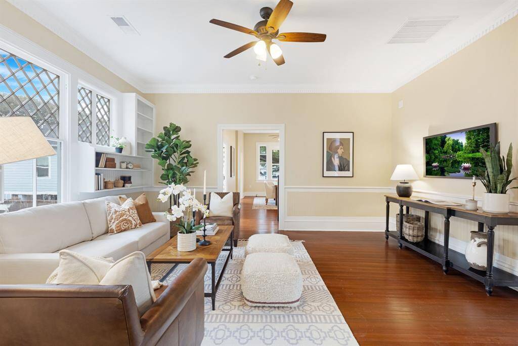 Unit 1: Effortless flow. From the front door to the dining area, this space was made for connection and conversation. A mix of modern updates and historical charm set the tone for memorable moments.