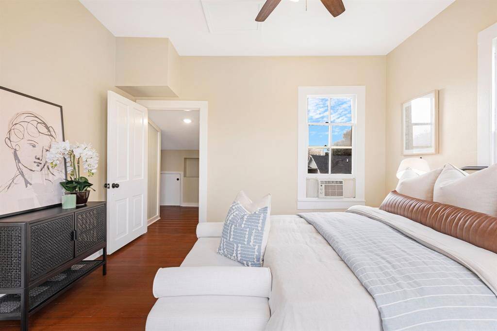 Unit 1: Restful and refined. This space was designed for winding down. Soft colors, classic trim, and rich wood floors create a sense of timeless ease.