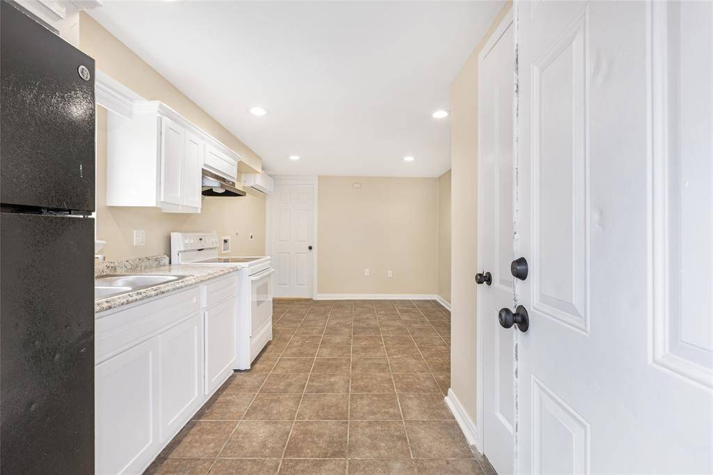 Unit 2: Step inside and relax. Welcome home to this bright and open kitchen + living space combo, ready for your personal touch. Clean lines and fresh finishes make it the perfect starting point for cozy living.
