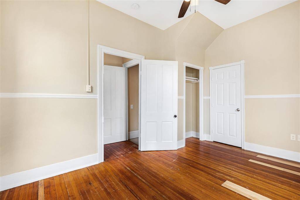 Unit 2: Two closets = double the charm. With not one but two closets, this upstairs bedroom checks all the boxes for storage and function. The charming angles and classic trim bring warmth and character.