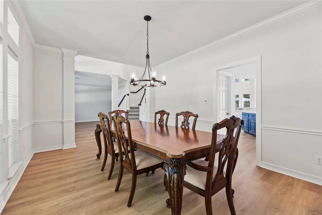 Open concept design creates an environment of possibilities. Depending on your preferences, the area can fit either a long or round table, as well as plenty of chairs.