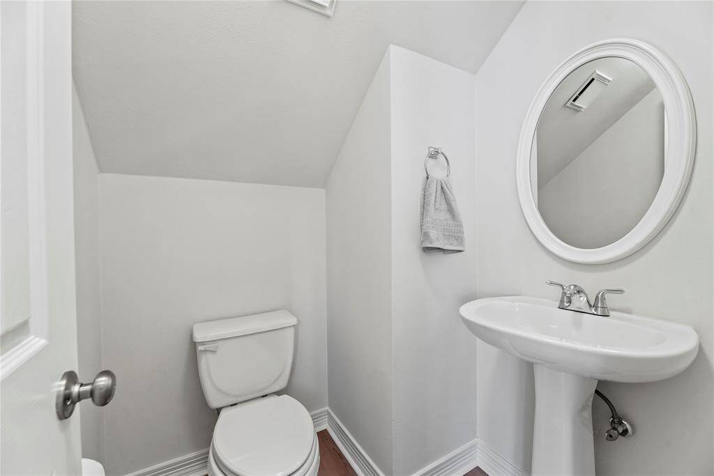 Hospitality is felt throughout the home and the powder room is no exception.