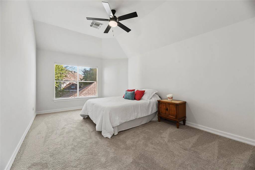 Plush brand new premium carpet and tons of natural light enhance the charm of the bedroom. Whether used for guests or children, the space is highly functional and warmly welcoming.