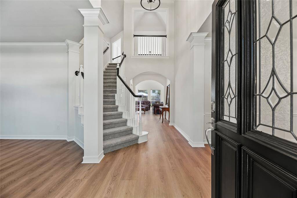 Grand and spectacular, the two-story foyer makes an impression on all your guests!